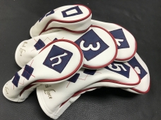 Pure White headcovers with red and navy accents with custom name laser etched in < Laid Back > font !